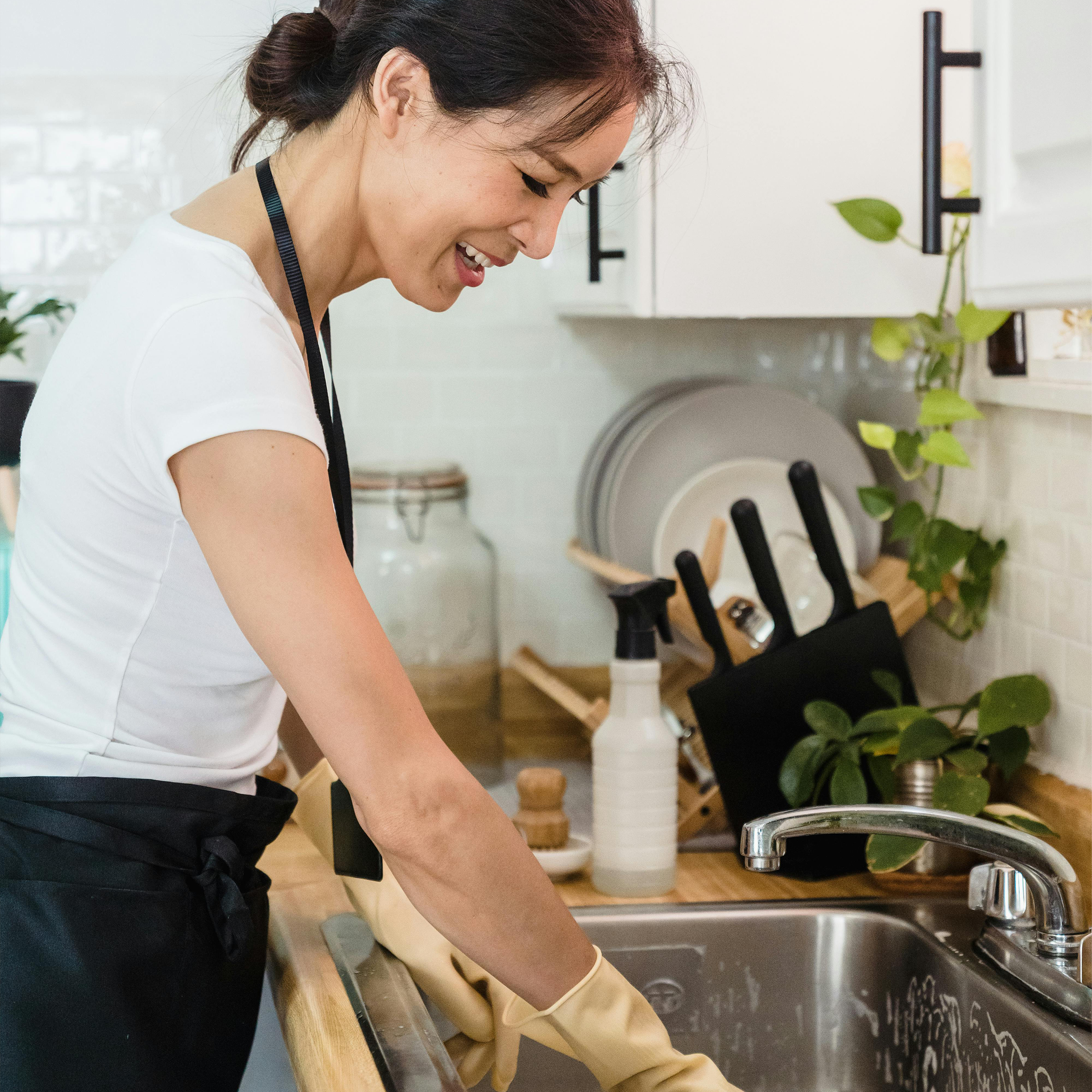 Woman washing dishes